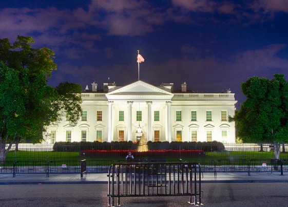 The White House at night during the Trump Administration.